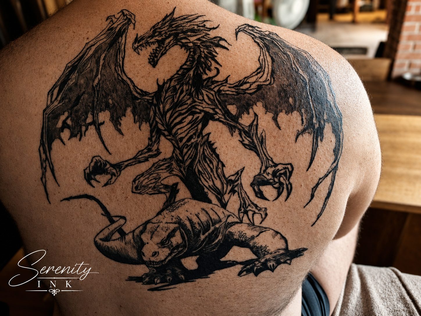Tatouage dragon semi-réaliste